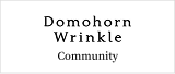 �uDomohorn Wrinkle Community�v�̃��S